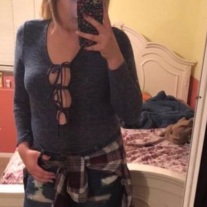 Blue plunge neck bodysuit